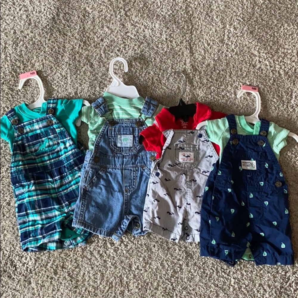 4 carter bibs sets size newborn. Sold as lot